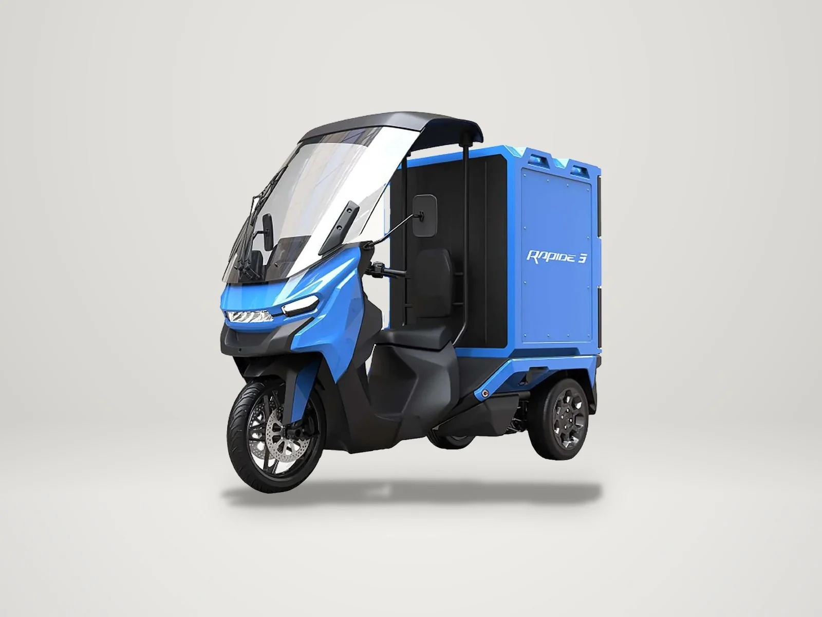藍色 Rapide3 三輪運輸車，前方騎乘座艙、後方方形貨箱